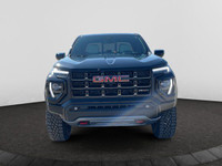 This 2025 GMC Canyon in Onyx Black is equipped with 4WD and Turbocharged Gas I4 2.7L/ engine. The GM... (image 7)