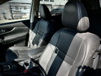 Stock#: 260013AThe 2018 Nissan Rogue SL is a practical and comfortable compact SUV, well-suited for... (image 5)