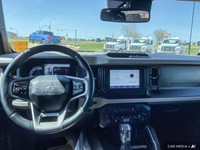 Unleash the thrill of open-air adventure with this stunning 2022 Ford Bronco convertible. Its powerf... (image 9)