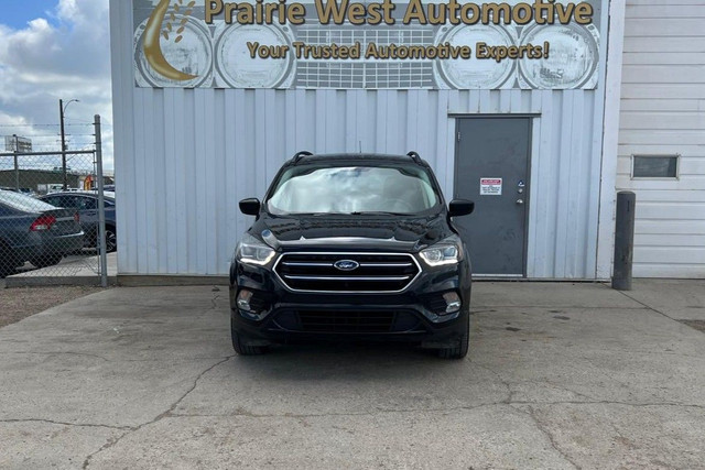 2019 Ford Escape SE 4WD - 2nd Seat of Tire in Cars & Trucks in Saskatoon - Image 3