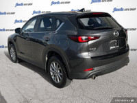WAS: $35879 NOW: $29998 plus taxes and licensing feesExplore the 2023 Mazda CX-5 GX: A Perfect Blend... (image 3)