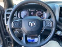The 2023 Ram 1500 Sport in Granite Crystal Metallic boasts a bold and rugged presence, complemented... (image 3)