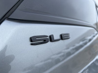 This pre-owned 2023 GMC Terrain SLE AWD in Sterling Grey Metallic offers a sleek design combined wit... (image 7)