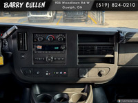 Introducing the 2025 Chevrolet Express Cargo Van in a crisp white hue with Rear-Wheel Drive that pro... (image 9)