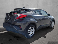 Make a bold statement on Ottawa's streets with this eye-catching 2022 Toyota C-HR, a compact crossov... (image 5)
