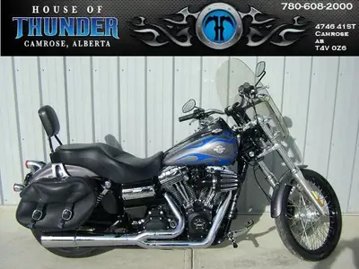 2014 Harley Davidson FXDWG Wide Glide Low-down and beefy, it’s got old-school chopper looks with the...
