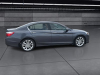 A rare and engaging manual transmission sedan offering comfort and performance. The Touring trim inc... (image 8)