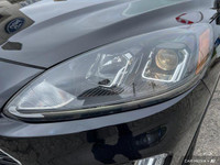 This Ford Escape boasts a Intercooled Turbo Premium Unleaded I-3 1.5 L/91 engine powering this Autom... (image 8)