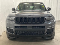 The 2025 Jeep Grand Cherokee L Limited 4x4 in sophisticated gray with its smooth 4x4 drivetrain prom... (image 1)
