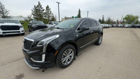 This Cadillac XT5 is equipped with: Leather Seating Surfaces w/Mini Perforated Inserts, Power moonro... (image 6)