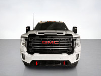 Drive our used Diesel powered 2021 GMC Sierra 2500 AT4 Crew Cab standard box 4X4 in Summit White and... (image 7)
