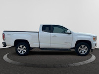 The GMC Canyon can carry up to 1620 pounds of people or cargo, and tow up to 7,000 pounds. White in... (image 5)