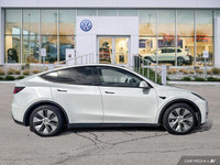 This Tesla Model Y boasts a Electric engine powering this Automatic transmission. Window Grid Antenn... (image 5)