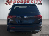 This Volkswagen Tiguan delivers a Intercooled Turbo Regular Unleaded I-4 2.0 L/121 engine powering t... (image 4)
