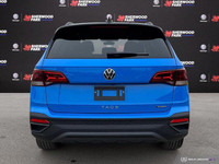 The 2024 Volkswagen Taos Comfortline Black Edition AWD blends turbocharged performance with bold bla... (image 4)