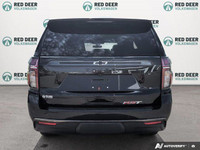 The 2021 Chevrolet Tahoe RST in black with a confident 4 4 drivetrain combines robust power and resp... (image 5)