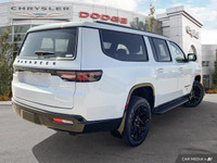 This Jeep Wagoneer L has a powerful EFH 3.0L I-6 Hurricane SO Twin Turbo ESS engine powering this Au... (image 5)