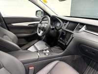 The 2021 Infiniti QX50 Luxe presents a compelling combination of power and sophistication with its e... (image 5)