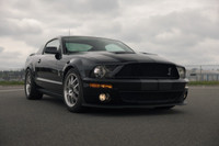 Equipped with a 500 hp supercharged 5.4L V8, 6-speed manual, and Brembo brakes for raw muscle. Deale... (image 1)
