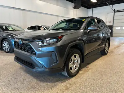 Our tough 2023 Toyota RAV4 Hybrid LE AWD offers mile after mile of bold style in Grey! Powered by a...