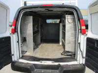 4.8 liter ,auto ,air , am/fm radio. work ready, cargo equipped with divider,ladder rack and loads of... (image 9)