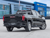 Commanding attention in Onyx Black, this 2022 GMC Sierra 1500 Denali embodies professional-grade lux... (image 6)