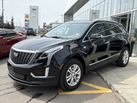 The 2024 Cadillac XT5 Luxury in Stellar Black Metallic combines refined styling with practical perfo... (image 3)