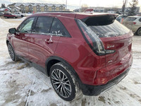 Introducing the New 2025 Cadillac XT4 Sport AWD, a striking SUV finished in radiant Red Metallic. En... (image 5)