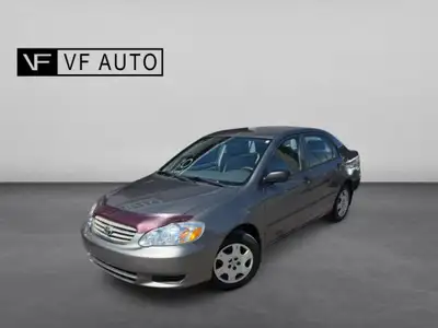 Toyota Corolla 2004, modèle de base, avec 165,937 km. Transmission automatique et moteur 1.8L fiable...