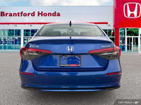 Experience the thrill of the 2022 Honda Civic Sedan Touring—a vehicle meticulously crafted for perfo... (image 4)