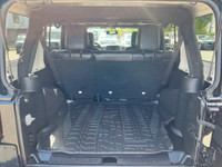 This 2018 Jeep Wrangler Sahara has a Black Exterior and Black Interior with seating for 5. Equipped... (image 5)