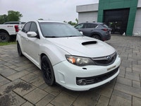 2014 Subaru WRX STI with the 6-speed manual and only 116,000kms! Vehicle comes safety certified! Two... (image 2)