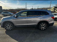 Anti-Lock Brakes; Fog Lights; Immobilizer; Compass; Back-Up Camera; CHROME DOOR HANDLES; Driver Info... (image 5)