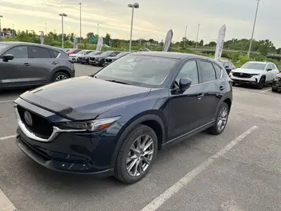 Le Mazda CX-5 GT Turbo 2021 est un VUS compact qui allie élégance, performance et raffinement. Propu...