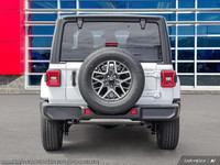 This Jeep Wrangler has a dependable Intercooled Turbo Premium Unleaded I-4 2.0 L/122 engine powering... (image 6)