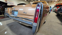 1977 Cadillac Eldorado Biarritz Coupe in Metallic Saddle Gold paint with matching light Saddle Leath... (image 8)