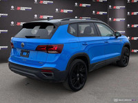 The 2024 Volkswagen Taos Comfortline Black Edition AWD blends turbocharged performance with bold bla... (image 5)