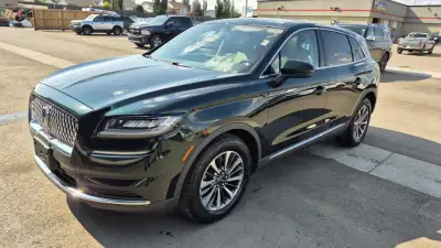 The 2021 Lincoln Nautilus Reserve is a mid-size luxury SUV that offers a blend of refined design, ad...