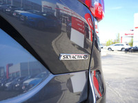 Turn heads and conquer the road in this sleek 2024 Mazda CX-5 GS, boasting a stunning Machine Grey M... (image 8)