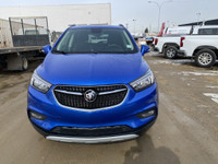 The 2017 Buick Encore Preferred II in Coastal Blue Metallic is a stylish and compact SUV that offers... (image 2)