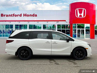 This 2023 Honda Odyssey Black Edition boasts a luxurious Platinum White Pearl exterior and a strikin... (image 6)
