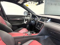 The 2024 Infiniti QX50 Sport boasts a powerful 2.0L turbocharged engine, generating an impressive 26... (image 7)