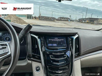 The 2017 Cadillac Escalade includes four-wheel drive, a hands-free power liftgate, an adaptive suspe... (image 9)