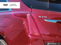 Turn heads in this stunning 2018 Cadillac XT5 Luxury AWD, boasting a vibrant Red Passion Tintcoat ex... (image 7)
