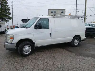 Call 416-648-0721 - ONE OWNER - Runs great - 2010 Ford E150 with Roof Rack for ladder towing, shelvi...