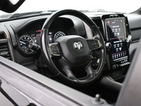 The 2021 Ram 1500 Rebel is a bold, off-road-focused full-size truck with a 5.7L HEMI V8 producing 39... (image 6)