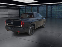 A rugged yet refined crew cab pickup with all-wheel drive and a 5.25 ft. box. The Black Edition incl... (image 7)