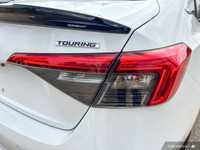 This Honda Civic Sedan boasts a Intercooled Turbo Regular Unleaded I-4 1.5 L/91 engine powering this... (image 9)
