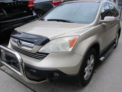 EX-L ALL WHEEL DRIVE. GOLD WITH BEIGE LEATHER INTERIOR. ALLOY WHEELS, SUNROOF, HEATED SEATS, KEY LES...
