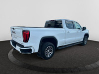 The All New GMC Sierra has been redefined from Hood to Hitch. This 4WD White Sierra is a Crew Cab Pi... (image 4)